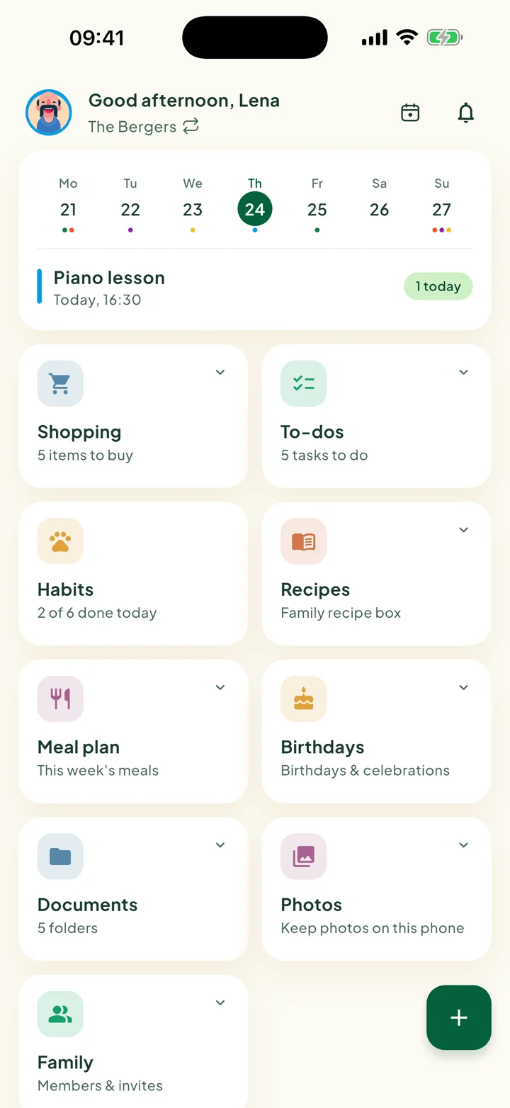 The Home screen with the week card and the tiles