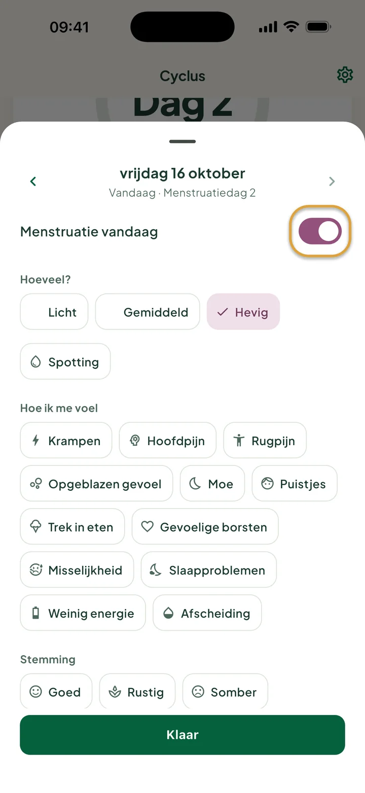 Het venster voor vrijdag 16 oktober: Menstruatie vandaag staat aan en Hevig is gekozen. De schakelaar is omcirkeld.